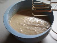 Gradually whisk in remaining whipping cream,...