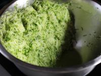 Grate the zucchini finely, add a little salt, mix...