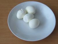 Hard boil the eggs, cool and peel....