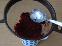 Peel raw beetroot and grate it finely. Put it in a...