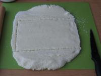 Use a rolling pin to spread it on a board...