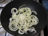 Peel onion, cut it into rounds, separate them and...