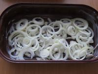 Peel onion, cut it into rounds, separate them and...