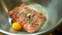 Mix minced meat with egg, milk, salt, ground black...