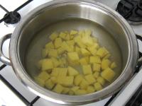 Brush potatoes, cut into a smaller cubes and put...