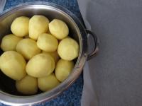 Clean, wash and cut potatoes into cubs....