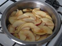 Place the apples into a saucepan with water and...