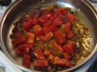 Add sliced tomatoes and a cleaned, grated piece of...