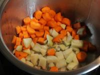 Clean and cut the carrots and onions. Roast...