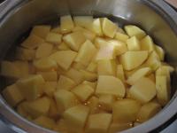 Brush potatoes, cut into a smaller cubes and put...