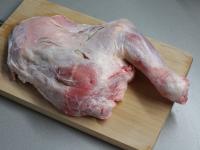 Wash the lamb shoulder and make small cuts with a...