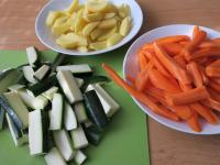 Peel, wash carrots and potatoes. Cut into thinner,...