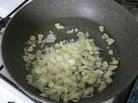 Clean the onion and garlic. Cut and fry it in a...