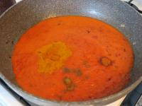 Return the paste to the pan and add the spices.Mix...