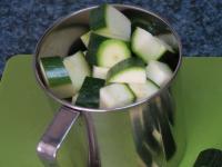 Wash the zucchini and cut into cubes....