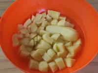 Peel the potatoes, keep one whole and cut the rest...