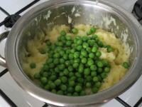 Stir peas into the mashed potatoes and serve...