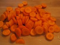 Clean the carrots, wash it and cut into rings....