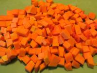 Peel the pumpkin and cut into cubes. Clean and cut...