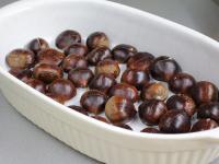 Put the chestnuts in a baking dish with the cutted...