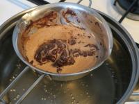 Melt the chocolate with the cream in a steam bath....