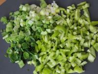 Clean the pepper and leeks, wash and cut them...