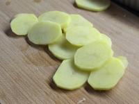 Cut the potatoes into slices about 2 mm thick....