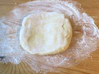 Roll the dough on a floured board to a thickness...