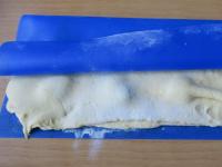 Using a silicone pad, put the dough without the...