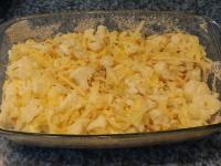 Grease the baking pot with butter and cover with...