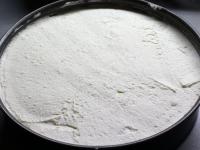 Whip the whipping cream with sugar and stabilizer,...