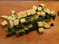 Wash the zucchini and cut into cubes....