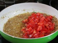 Add finely chopped tomatoes and cook until soft....