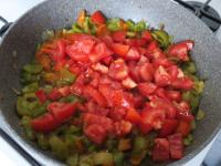 Wash the tomatoes and cut them into cubes. Add to...