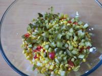 Add drained corn, peppers and cucumbers to the...