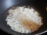 Peel an onion, chop finely and cook in oil....