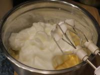 Stir egg whites foam into the dough. ...