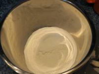 Put less than a cup of flour into the bowl....