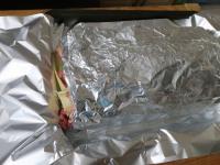 Place the roulade wrapped in foil on a baking dish...