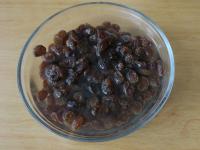 Wash the raisins and soak them in water for 20...