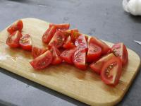 Wash the tomatoes and cut it into small pieces....