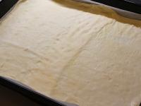 Roll the puff pastry on baking paper to the size...