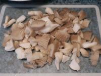 Wash the mushrooms and cut them....