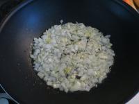 Peel an onion, chop finely and cook in oil....