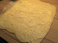 Roll the dough into a rectangular shape and spread...