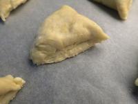 Roll and cut into triangles. Bake on a baking...