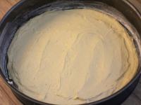 Pour the dough into a round mold lined with baking...