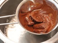 Melt the chocolate in a water bath. ...