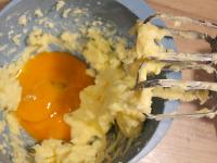 Whip the butter with the sugar, add the egg yolks....