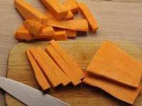 Peel a larger sweet potatoe and cut it into...